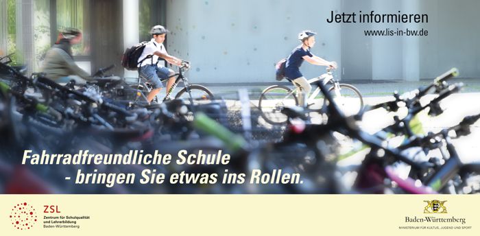 Schüler auf dem Fahrrad mit Text Fahrradfreundliche Schule - Bringen Sie etwas ins Rollen